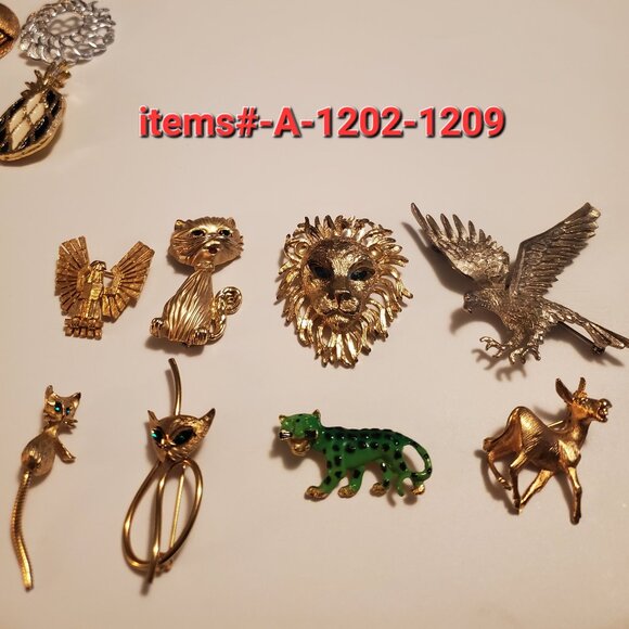 from GGMJTREASURES Jewelry - 8 Animals Pins or Brooches, items # A -1202- 1209,  wt. 113 grams .